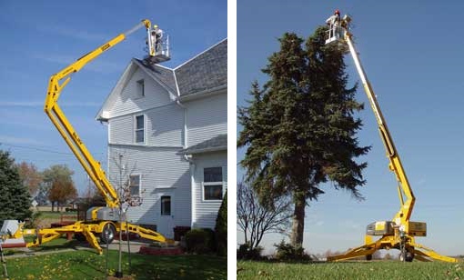 Bill Jax 5533A Towable Boom lift used for trimming large tree