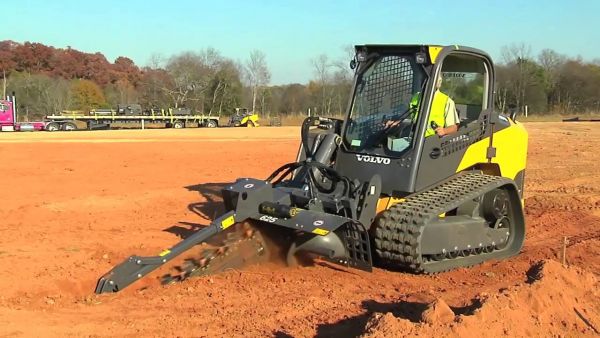 MCT135C Compact Track Loader with tiller attachment