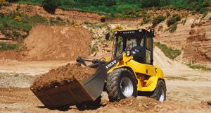 L35B Volvo CE compact wheel loader moving earth