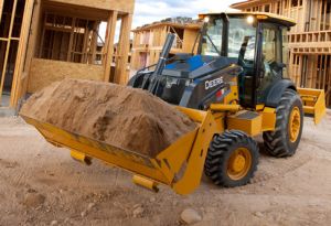 John Deere Landscape Loader moving dirt on home construction site