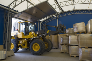 L70G Wheel Loader loading materials in warehouse